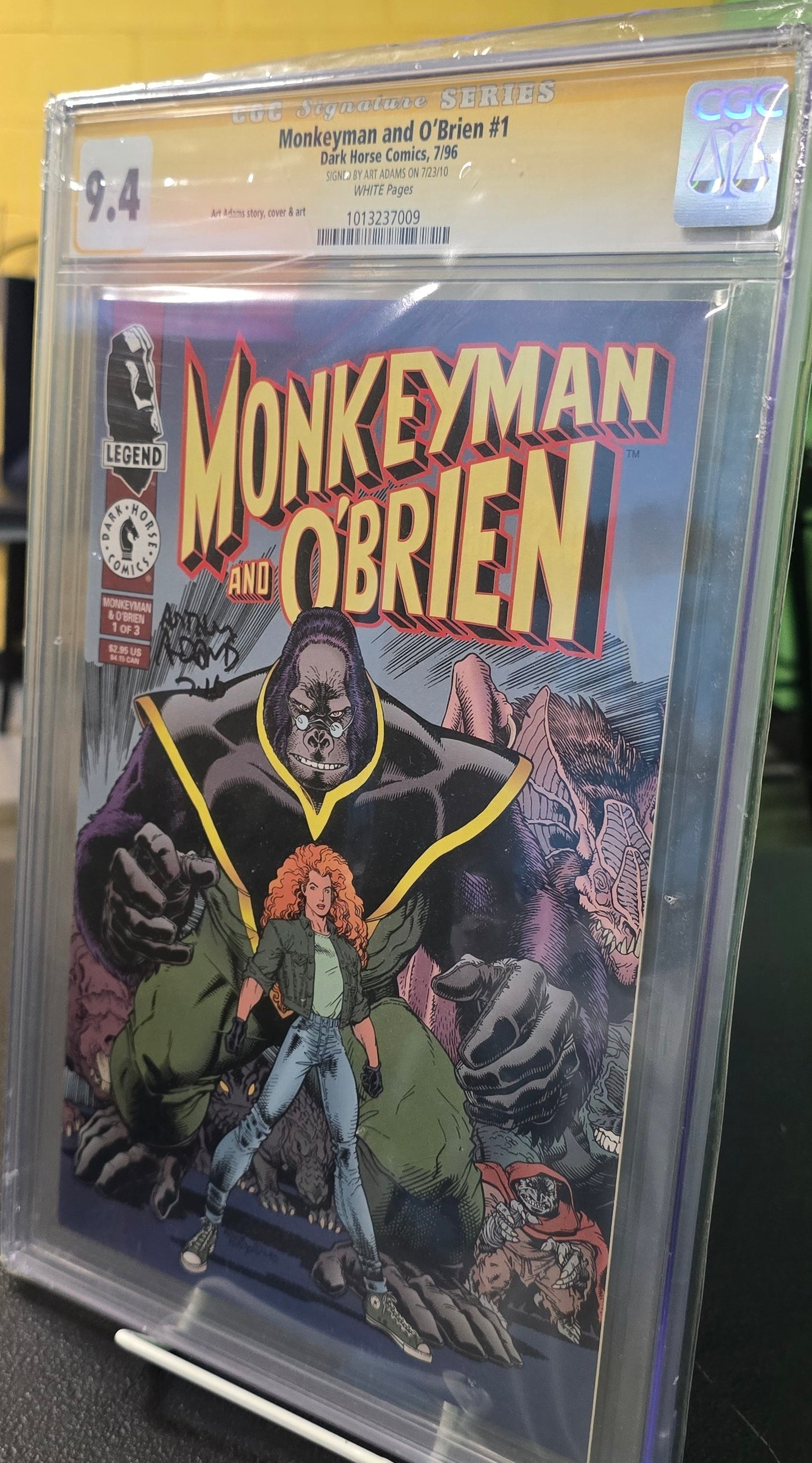 Monkeyman and O'Brien #1 GCG 9.4 Signed by Art Adams