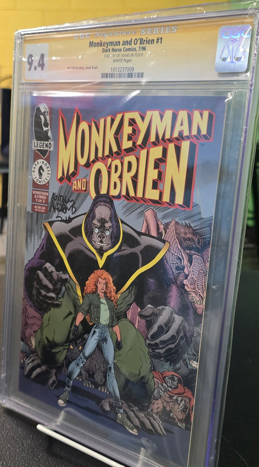 Monkeyman and O'Brien #1 GCG 9.4 Signed by Art Adams