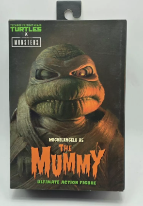 Universal Monsters x Teenage Mutant Ninja Turtles – 7” Scale Action Figure – Ultimate Michelangelo as The Mummy (NECA)